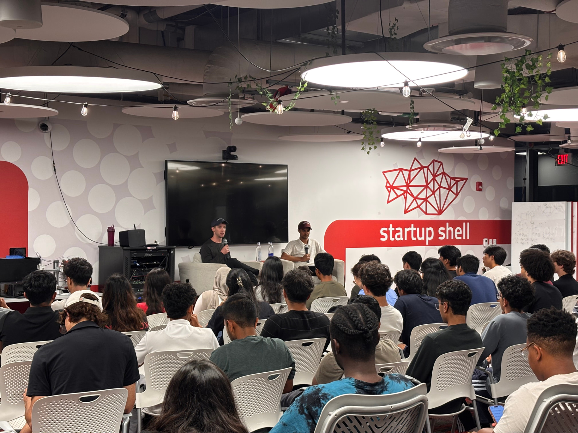 Adam Pouliot speaking at a talk hosted by Startup Shell and Z-Fellows